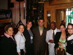 Photo of the staff of the Bronx SBDC shown with SBA Administrator Hector Barreto