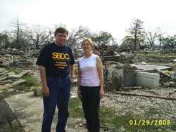 Dave Mallen (left) of the SBDC Disaster Assistance Team pictured amidst hurricane destruction in New Orleans